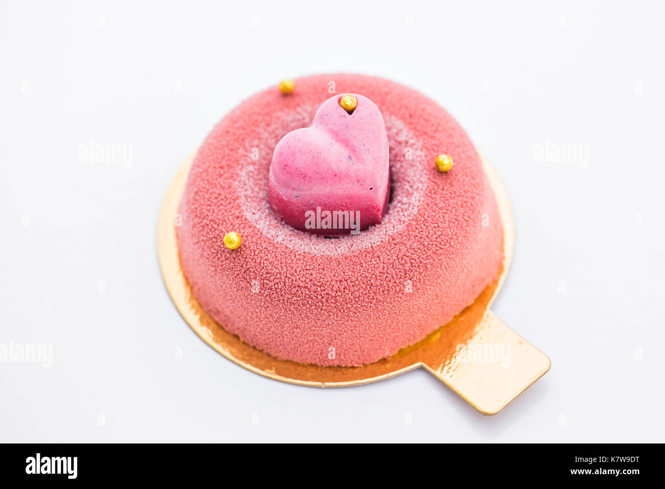 Pink cupcake background on white Stock Photo - Alamy