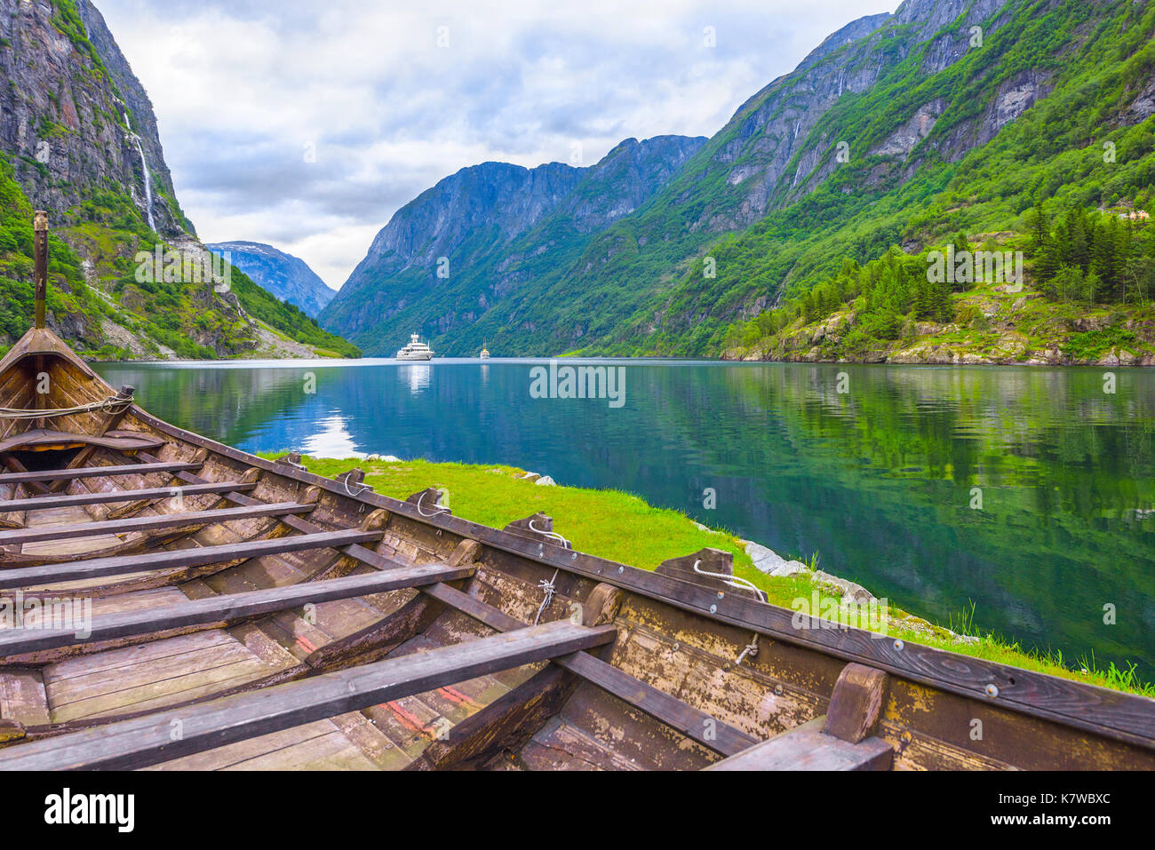 Viking boat and a ferry in the Naeroyfjord, shore of Gudvangen, Norway, Scandinavia Stock Photo