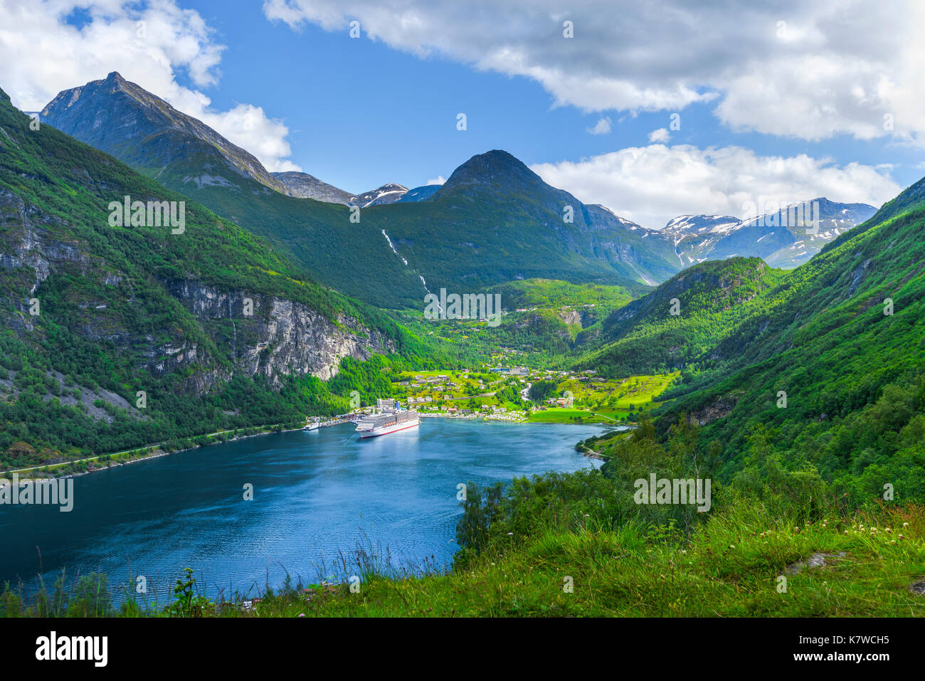 a cruise ship anchoring in the bay of Geiranger, panorama view