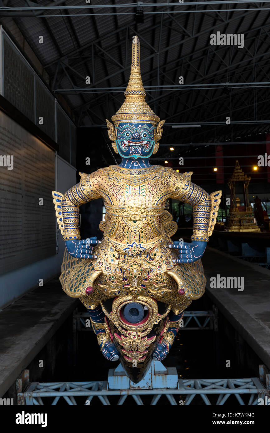 Asura Vayuphak has a Figurehead of an ogre-faced bird. Face, hands and feet are indigo, the front is purple, and the back is green. The hull is black  Stock Photo