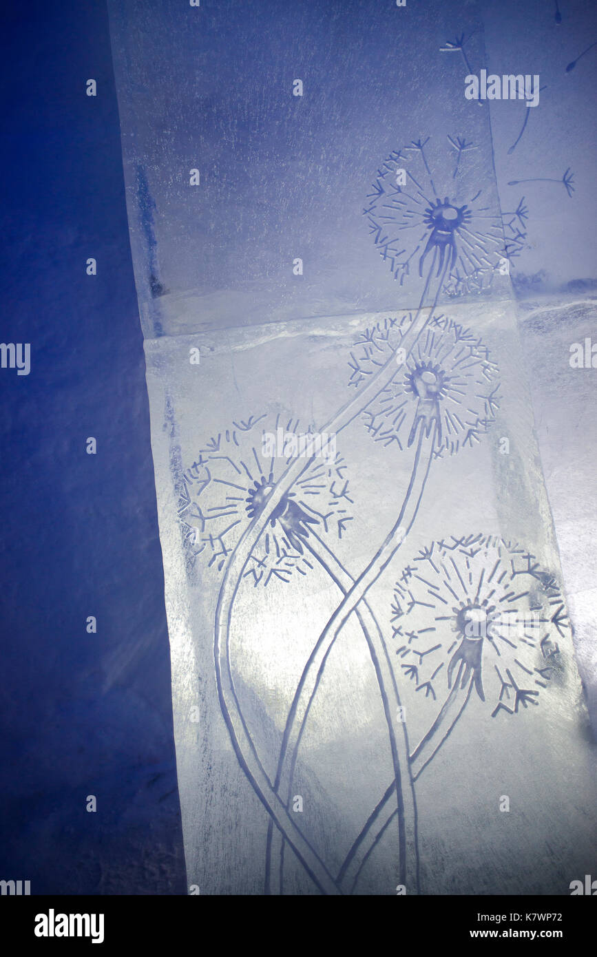 Delicate ice carving of dandelion seed heads Stock Photo