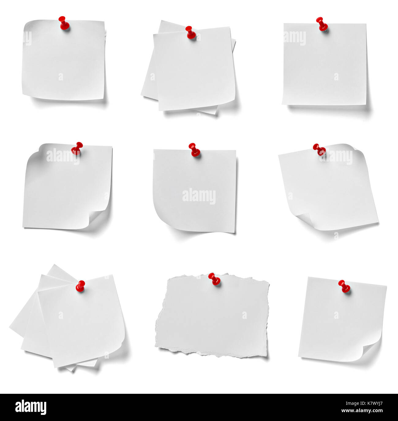 collection of various note paper with a red push pin on white ...