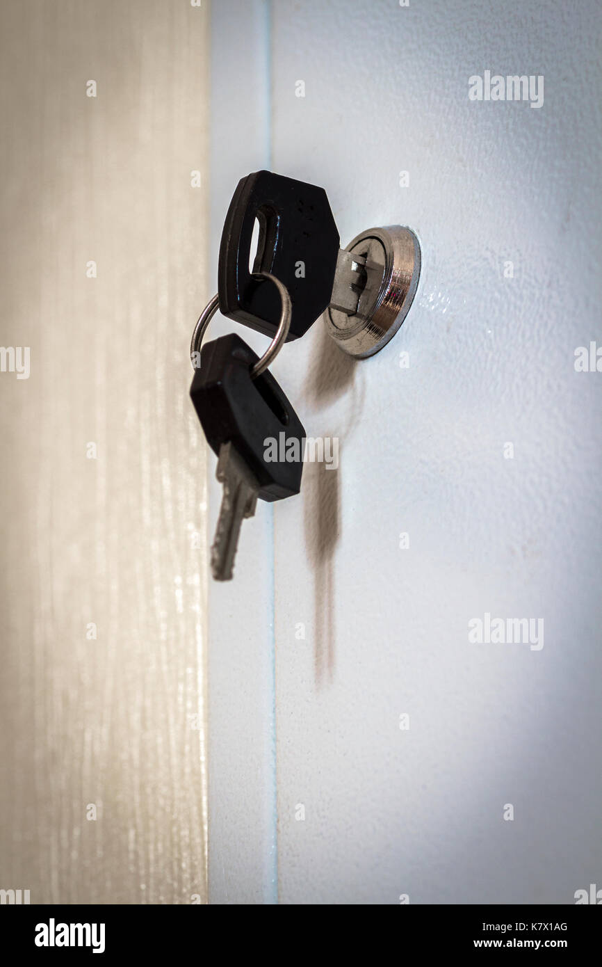 The key in the keyhole shield power up close. Stock Photo