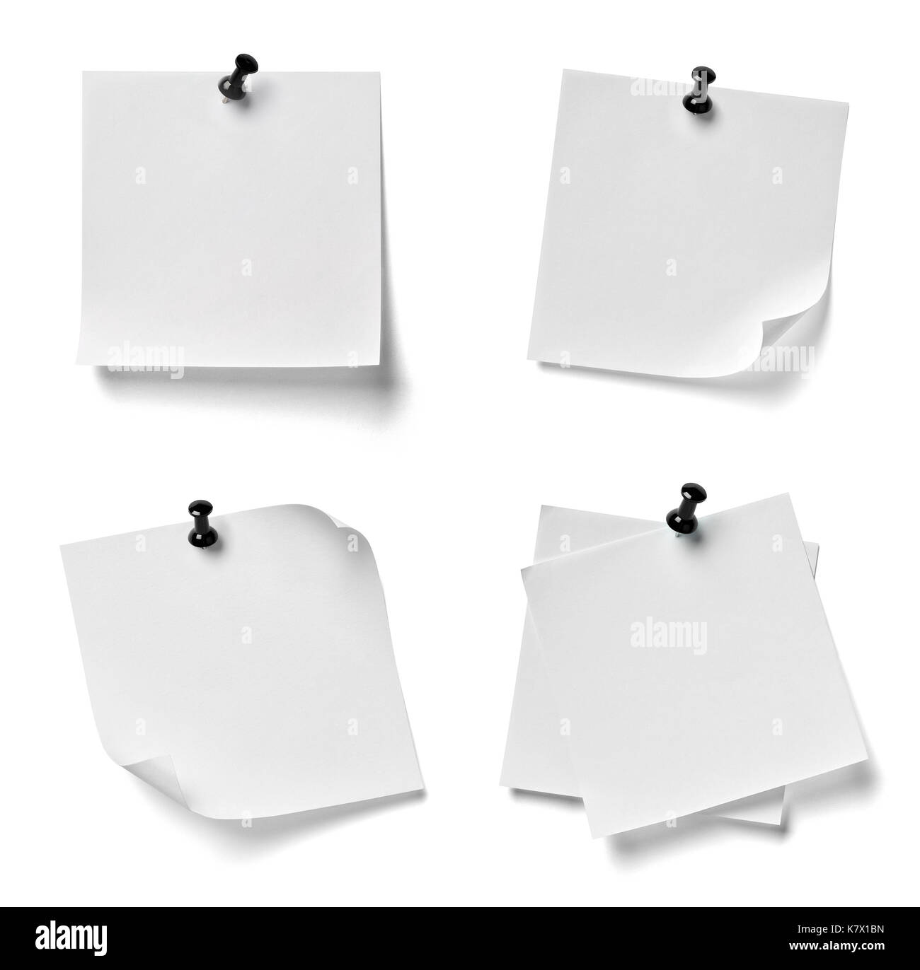 collection of various note paper with a red push pin on white ...