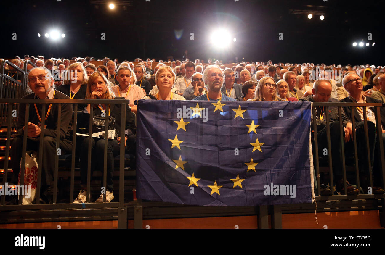 A European Union flag hangs in front of delegates during the second day of the Liberal Democrats Autumn Conference at the Bournemouth International Centre. Stock Photo