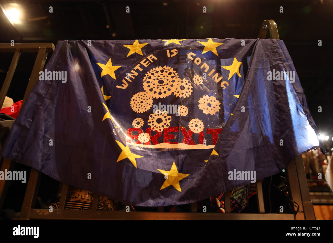 A European Union flag with the words Winter is Coming printed on it is hung in the auditorium during the second day of the Liberal Democrats Autumn Conference at the Bournemouth International Centre. Stock Photo