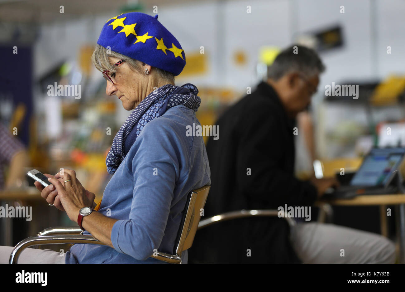 A Liberal Democrat supporter wearing a European Union flag beret on the second day of the party's Autumn Conference at the Bournemouth International Centre. Stock Photo