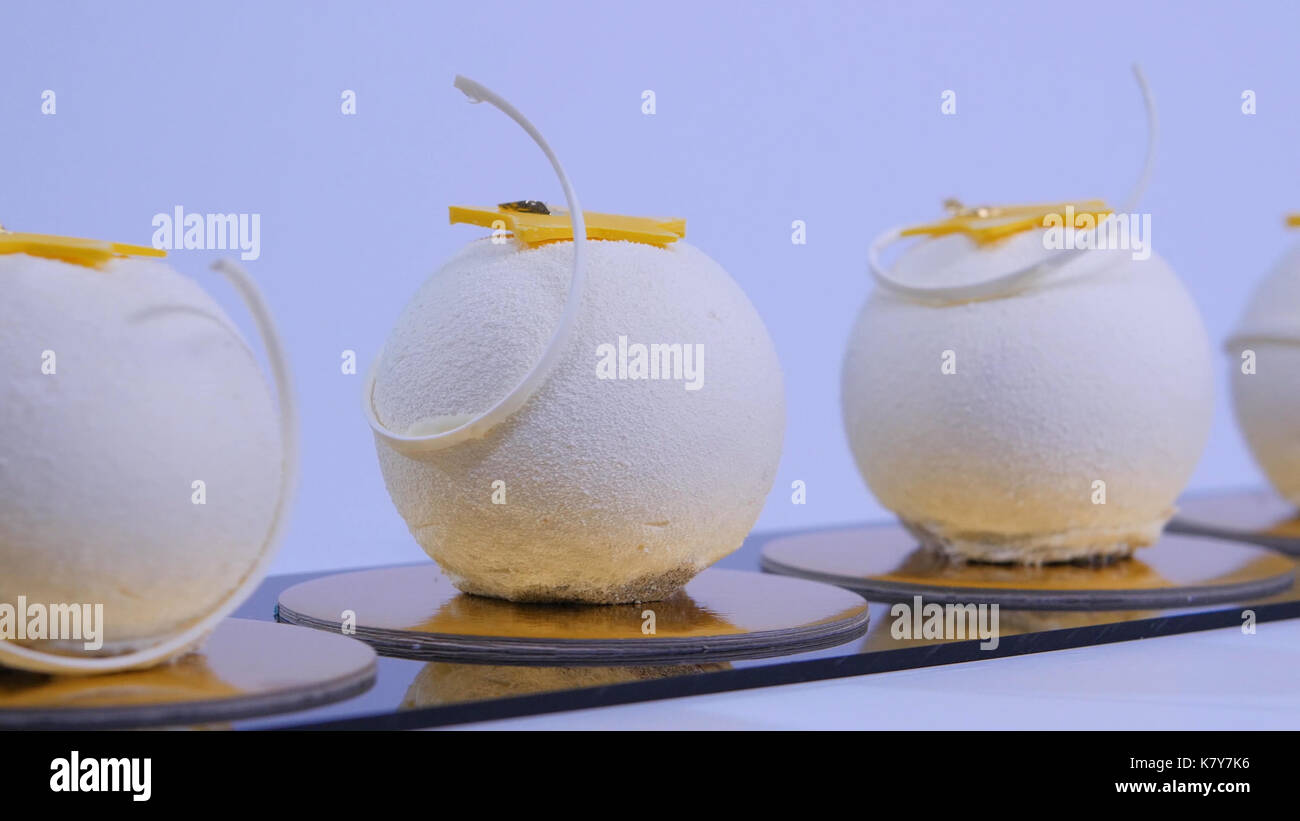 Velvet cake balls with sugar sprinkles. White, ballshaped cakes