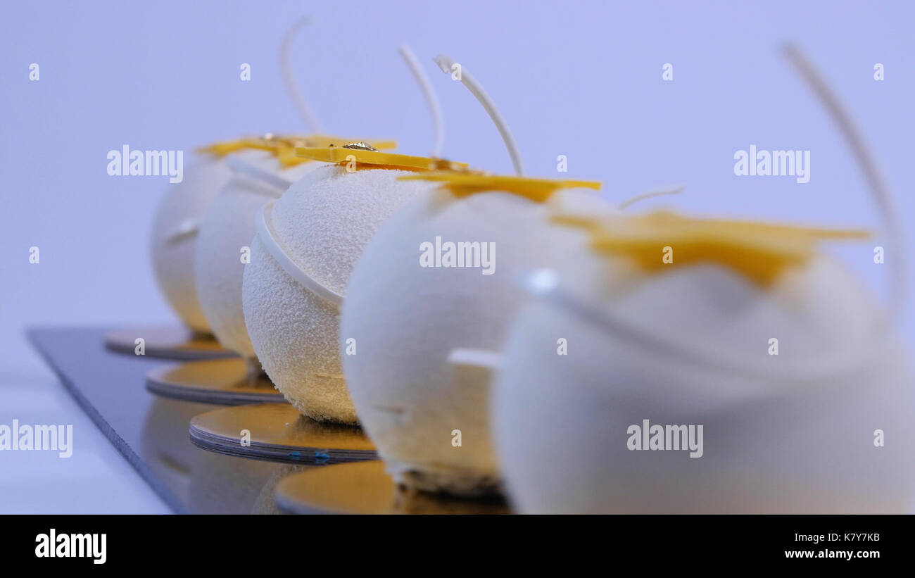 Velvet cake balls with sugar sprinkles. White, ballshaped cakes