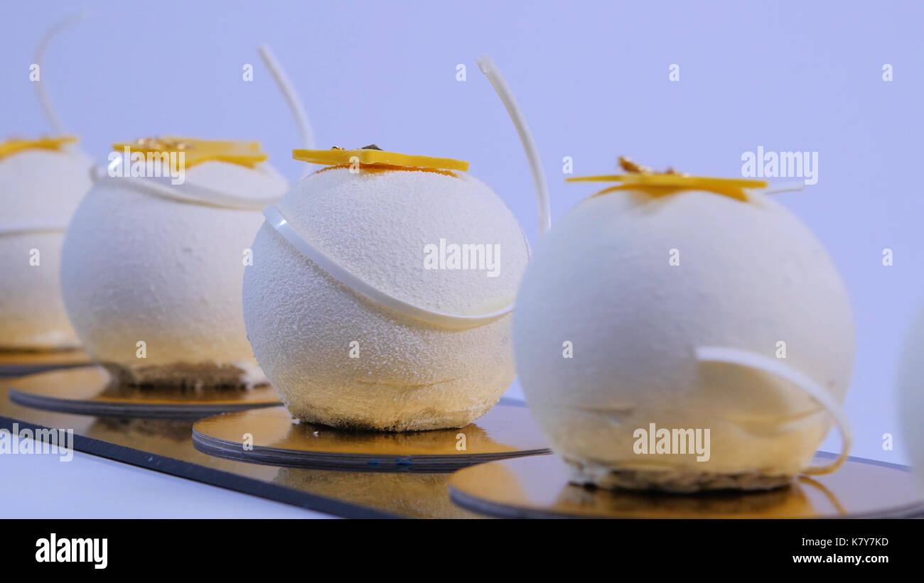 Velvet cake balls with sugar sprinkles. White, ballshaped cakes