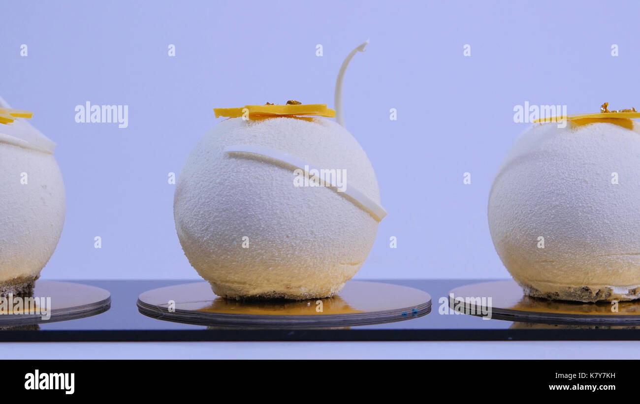 Velvet cake balls with sugar sprinkles. White, ballshaped cakes