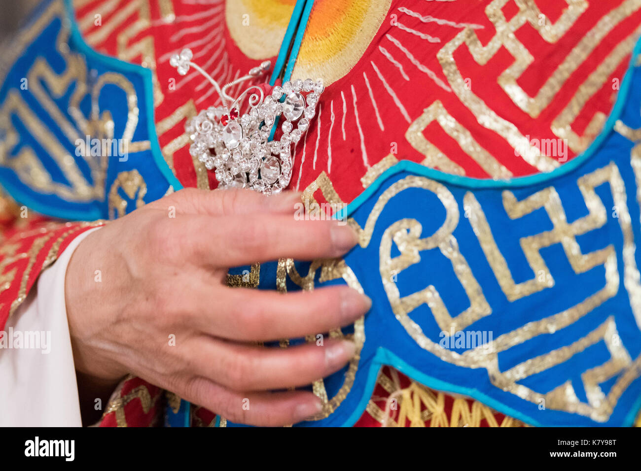 Intricate embroidery of a Beijing Opera singer's costume Stock Photo