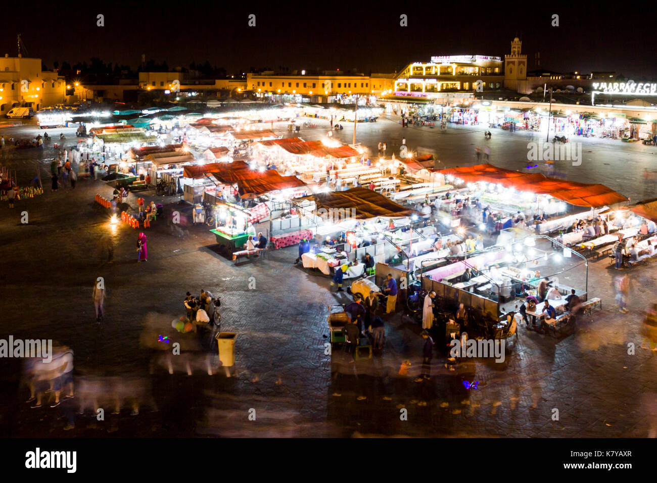 Main square of city full of people at night. Marrakech, Marrakech-Safi