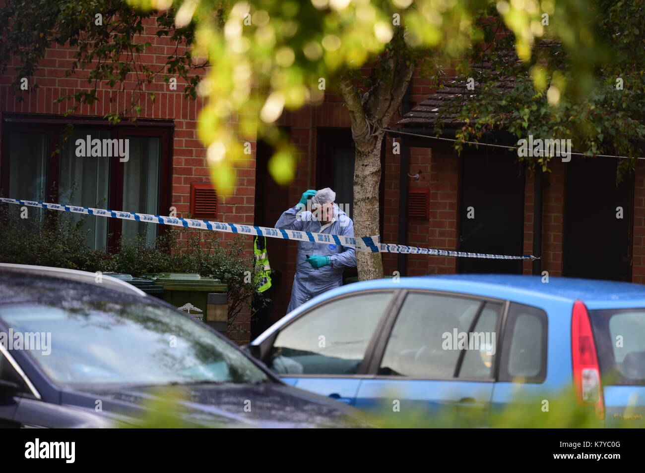A forensics officer at a property in Stanwell, Surrey, which is being searched by police investigating the Parsons Green bombing. Stock Photo