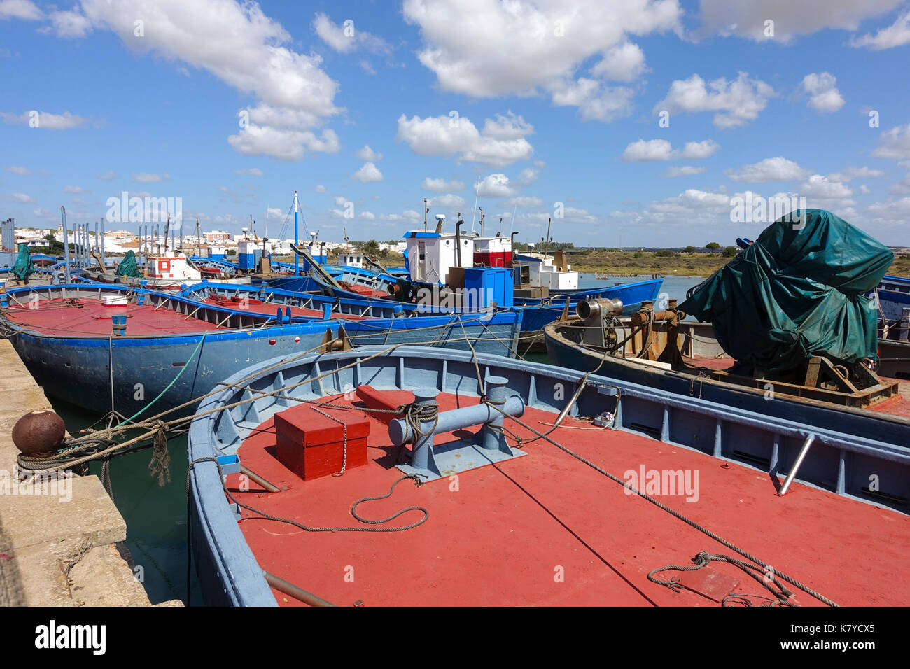 Barbate river, Traditional Red tuna fishing boats moored in old port, Almadraba, harbour, Cadiz, Andalusia, Spain. Stock Photo
