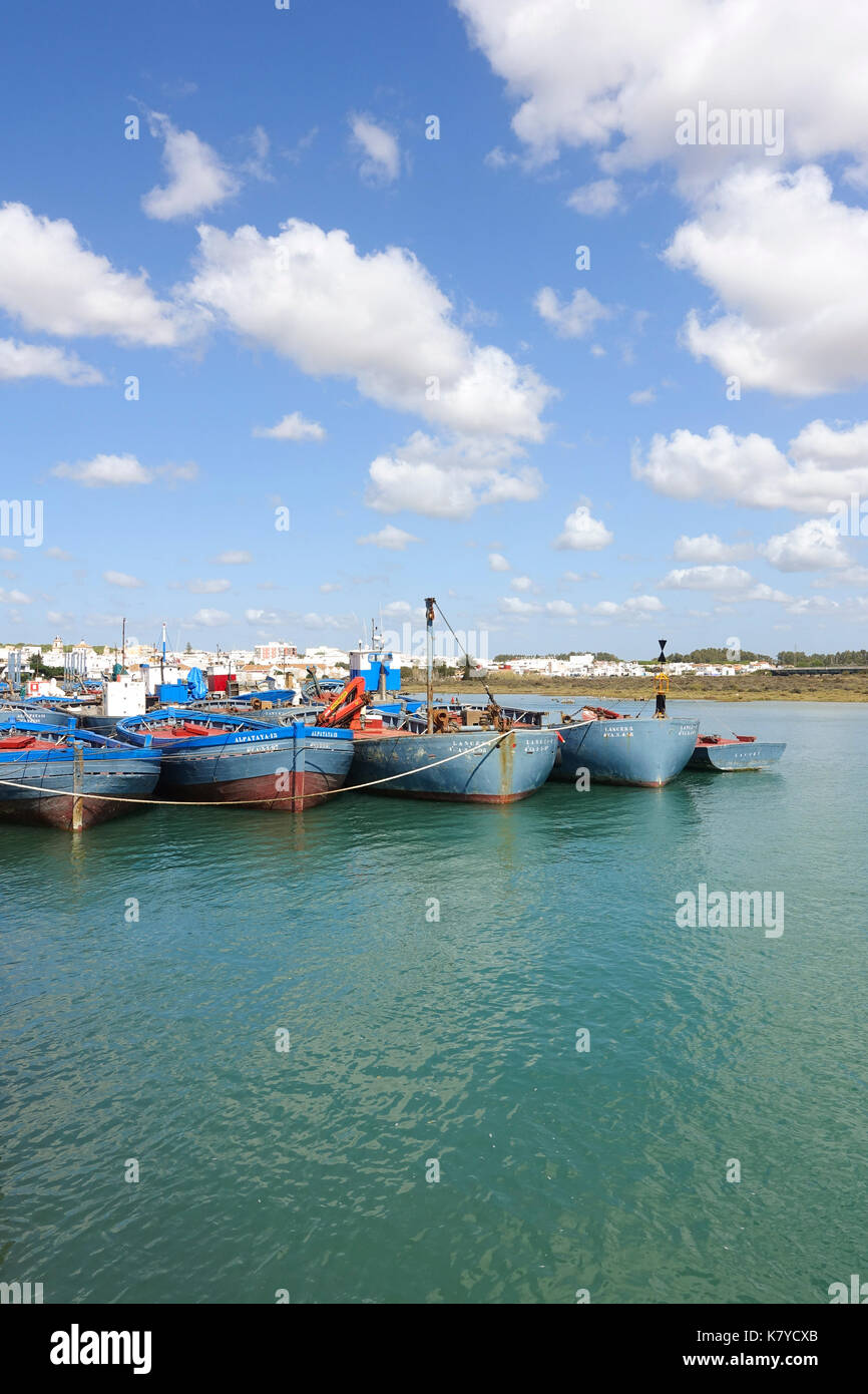 Barbate, Traditional Red tuna fishing boats moored in old port, Almadraba, harbour, Barbate river, Cadiz, Andalusia, Spain. Stock Photo