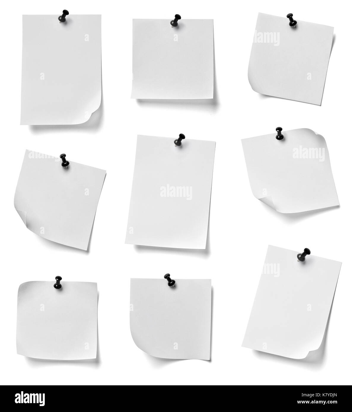 collection of various note paper with a red push pin on white ...
