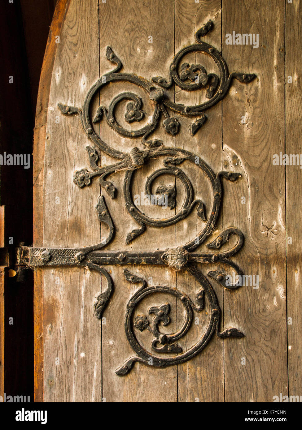 Elaborate Iron Hinge on Old English Church Door Stock Photo