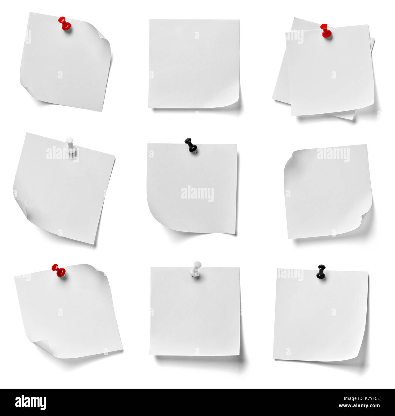 collection of various note paper with a red push pin on white ...