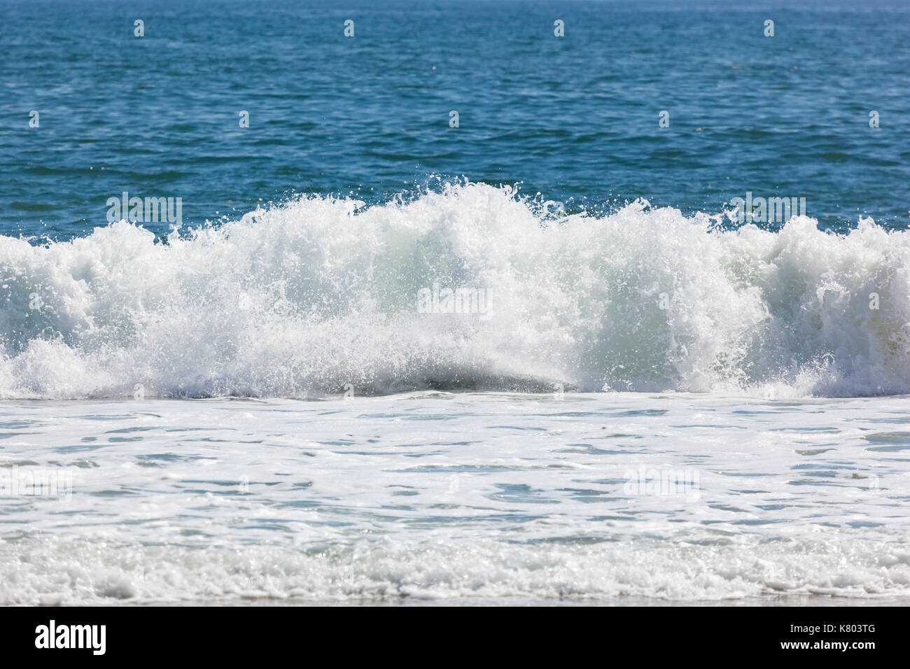 Beautiful waves roll and crash along the shore at Sea Girt beach in New