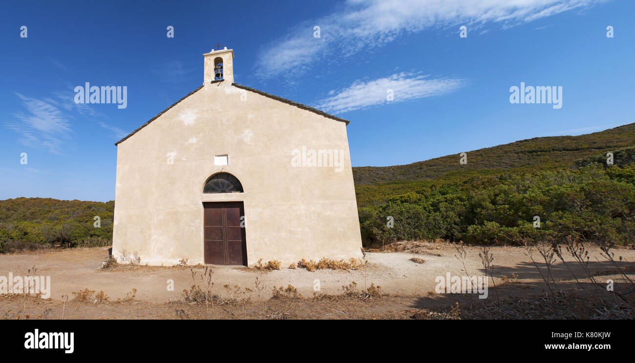 Corsica: the Chapelle Santa Maria (Saint Mary Chapel), a little church surrounded by the Mediterranean maquis on the the Sentier des Douaniers Stock Photo