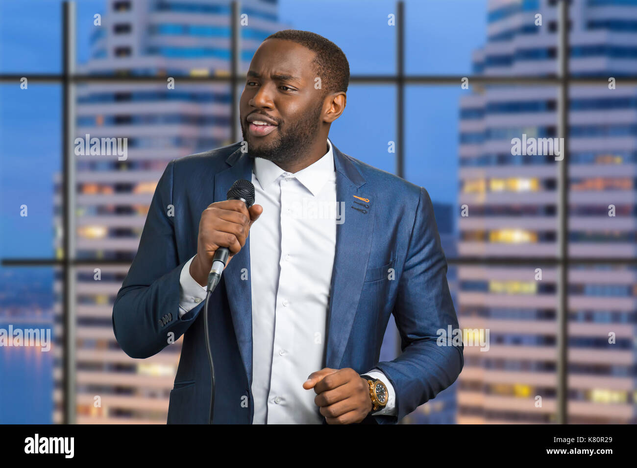 Black man singing microphone black hi-res stock photography and images ...