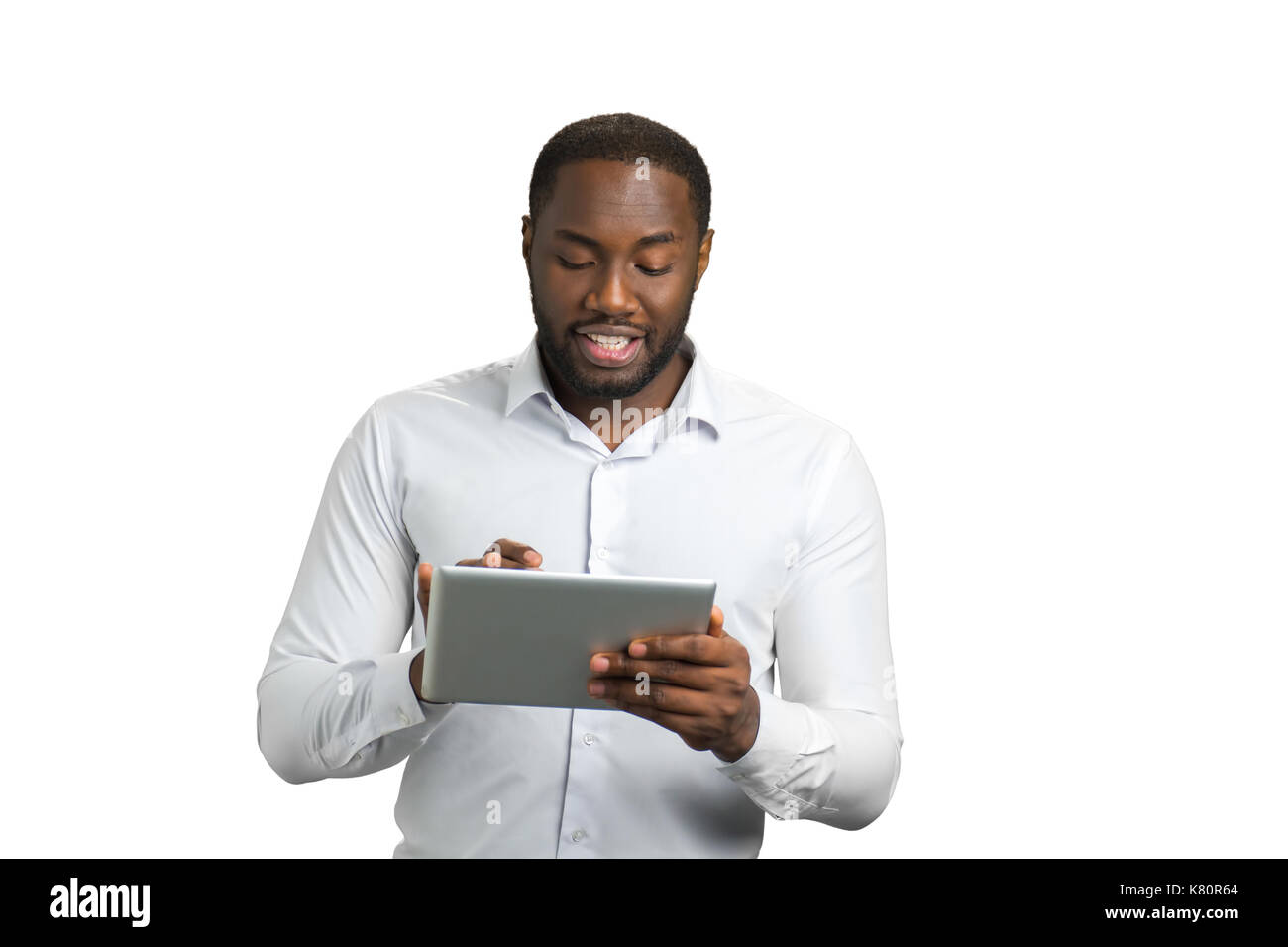 Black businessman using computer tablet. Stock Photo