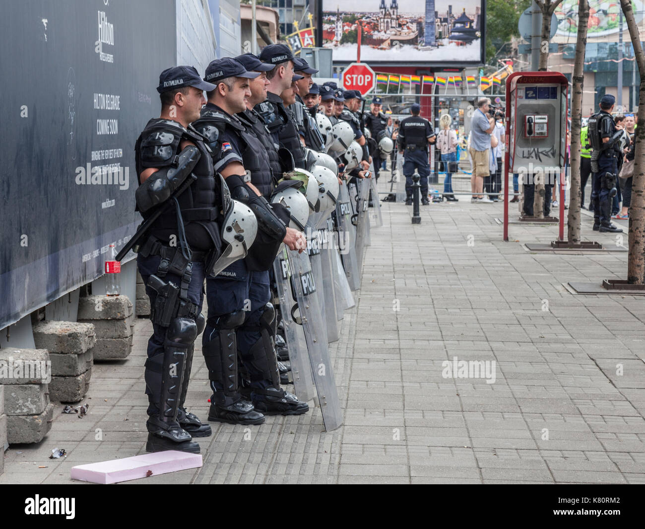 BELGRADE, SERBIA - SEPTEMBER 17, 2017: Serbian policemen protecting the 2017 edition of the Belgrade gay pride. The parade happened this year without trouble, under huge police watch.   Picture of the 2017 edition of the belgrade gay pride in Serbia. The pride was held on the 17th of September, it was the third consecutive edition without clashes, after several years of prohibition, and other years where huge fights opposed demonstrators, policemen and anti-homosexual activists Stock Photo