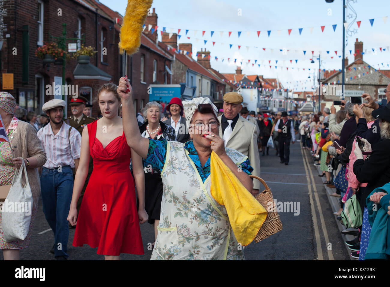 Sheringham Norfolk, UK. 17th September, 2017. Hundreds of people turn out dressed up in vintage clothing for the North Norfolk Railway 1940s weekend. The event ended with a parade through the town on Sunday afternoon. Credit: Stephanie Humphries/Alamy Live News Stock Photo