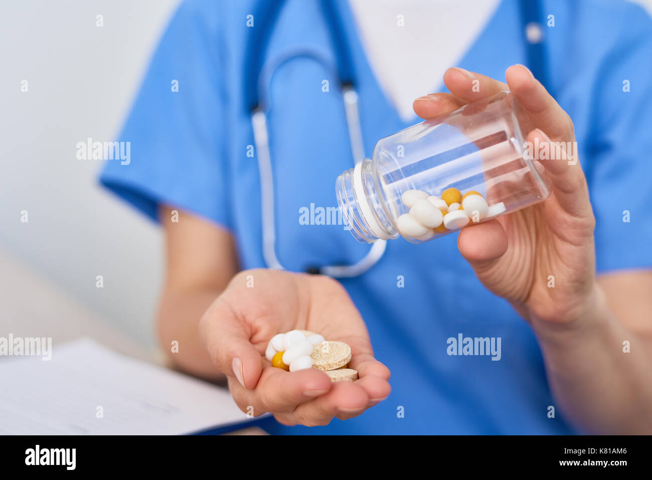 Physician Holding Pill Bottle Stock Photo Alamy