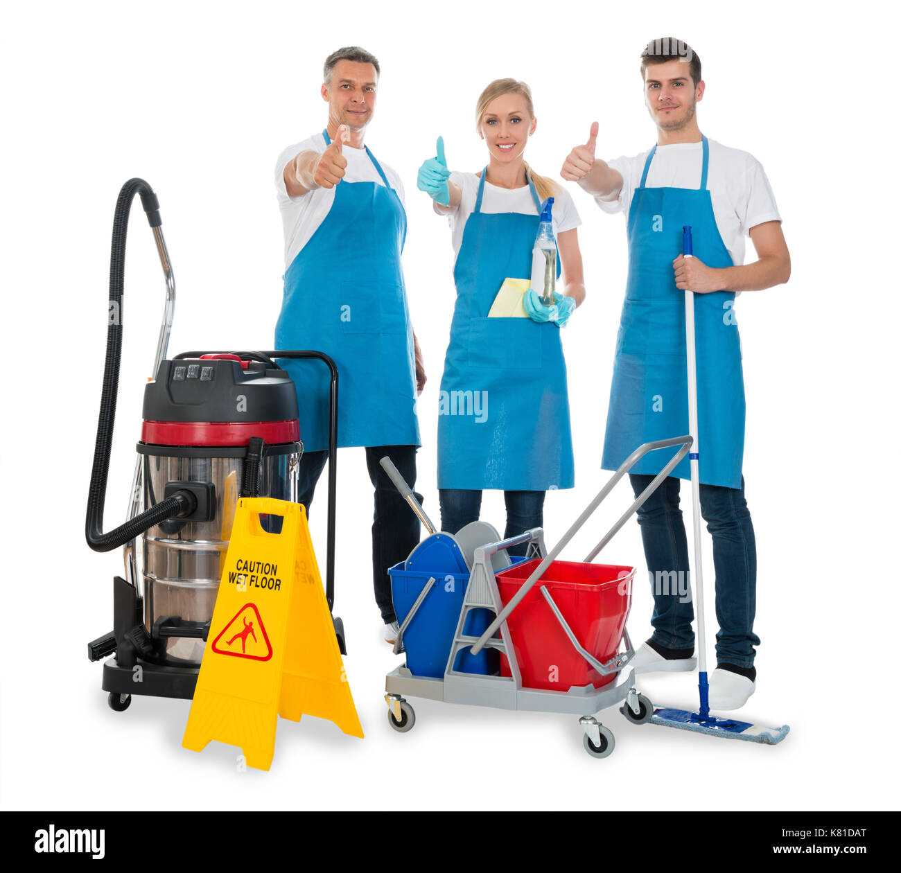 Group Of Janitors With Cleaning Equipments Over White Background Stock