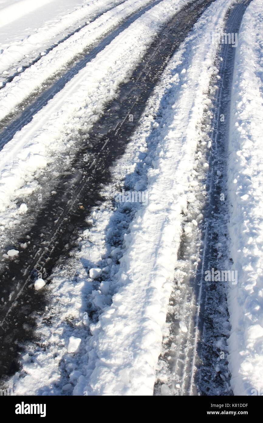 snowy road in winter Stock Photo
