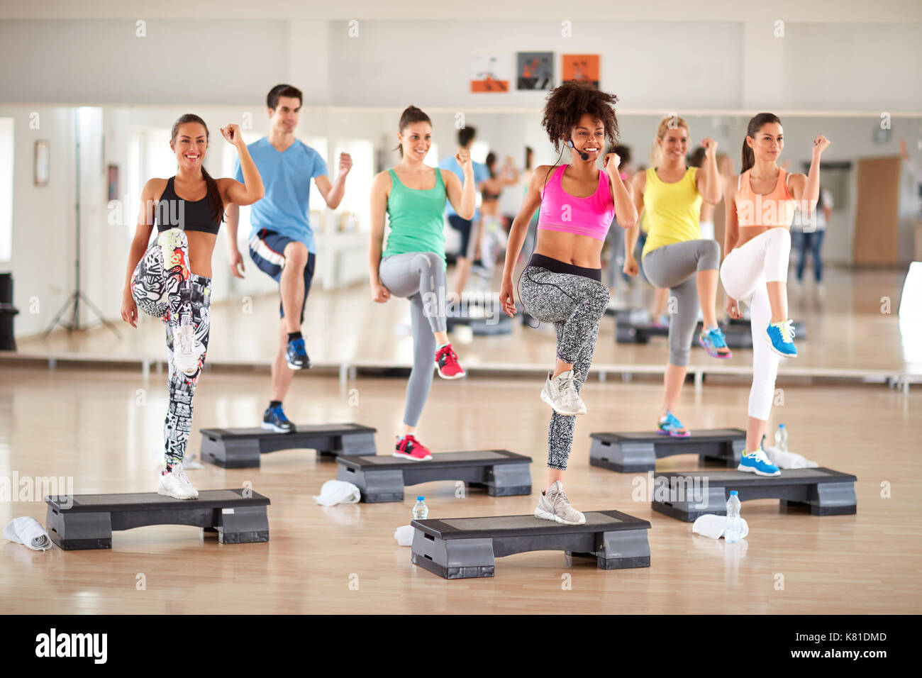 Fitness training in group at gym Stock Photo