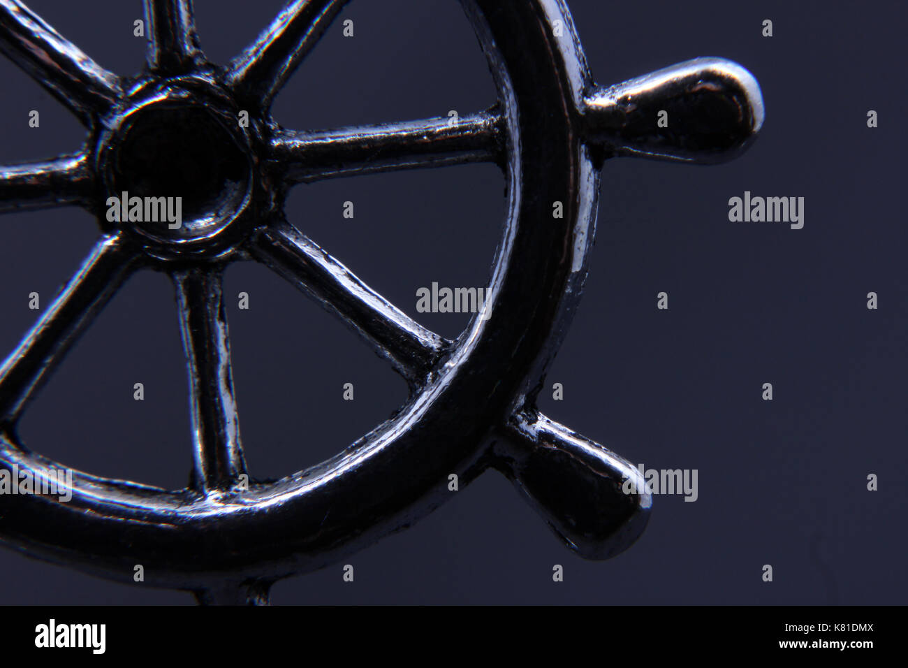 steuerrad eines bootes aus metall als schmuck, steering wheel of a boat made of metal as jewelry Stock Photo