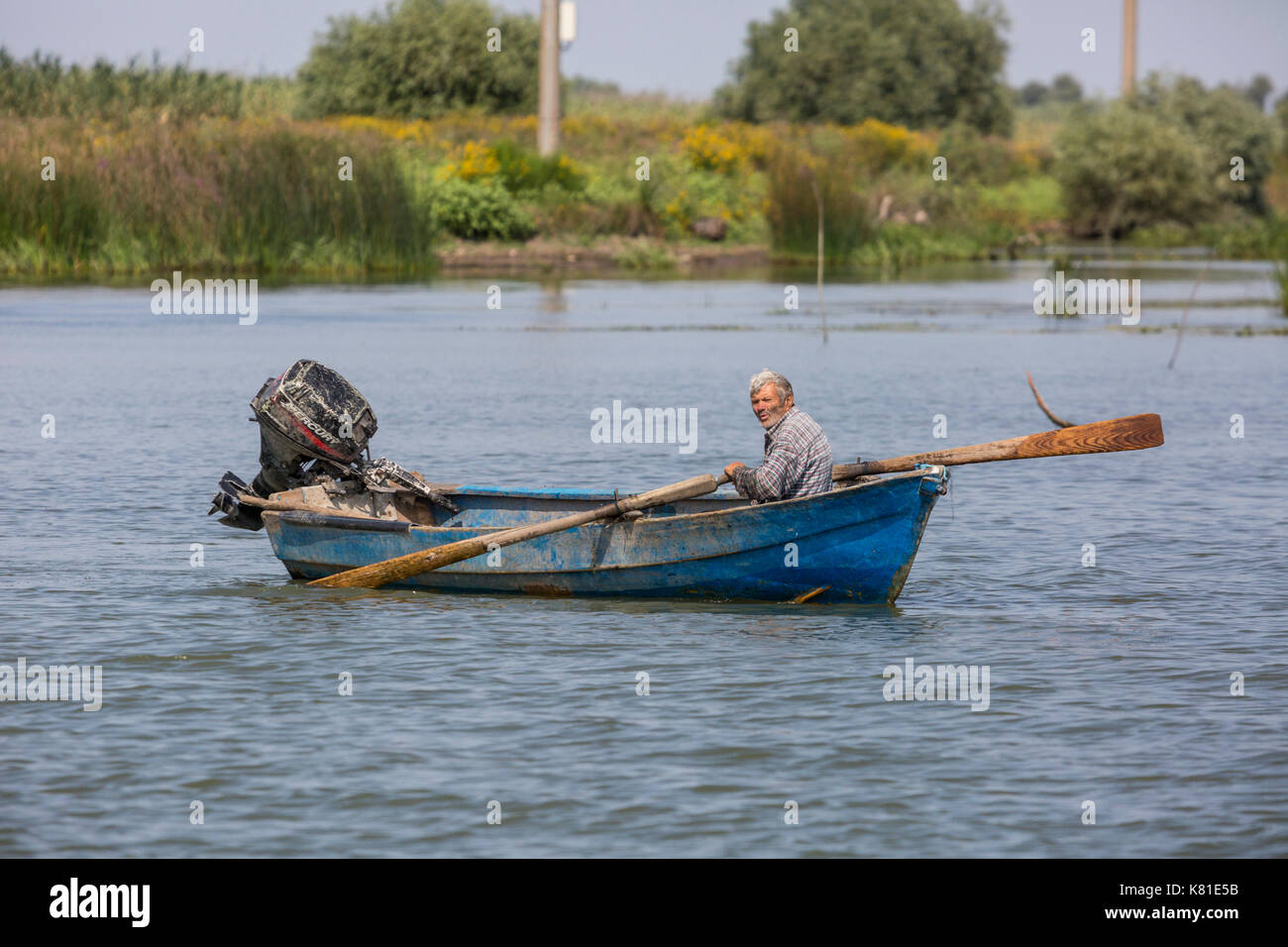 Fisherman rowing traditional fishing hi-res stock photography and ...