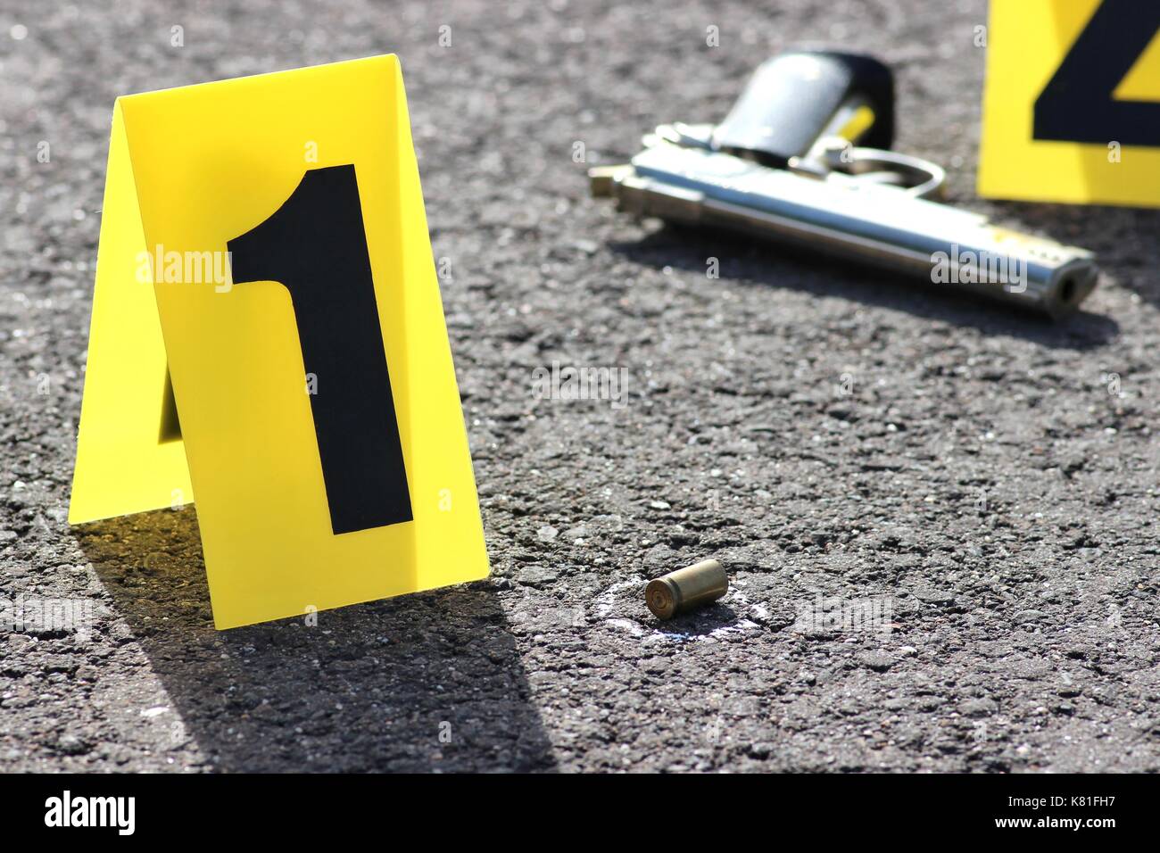 ID tents at crime scene after gunfight Stock Photo - Alamy