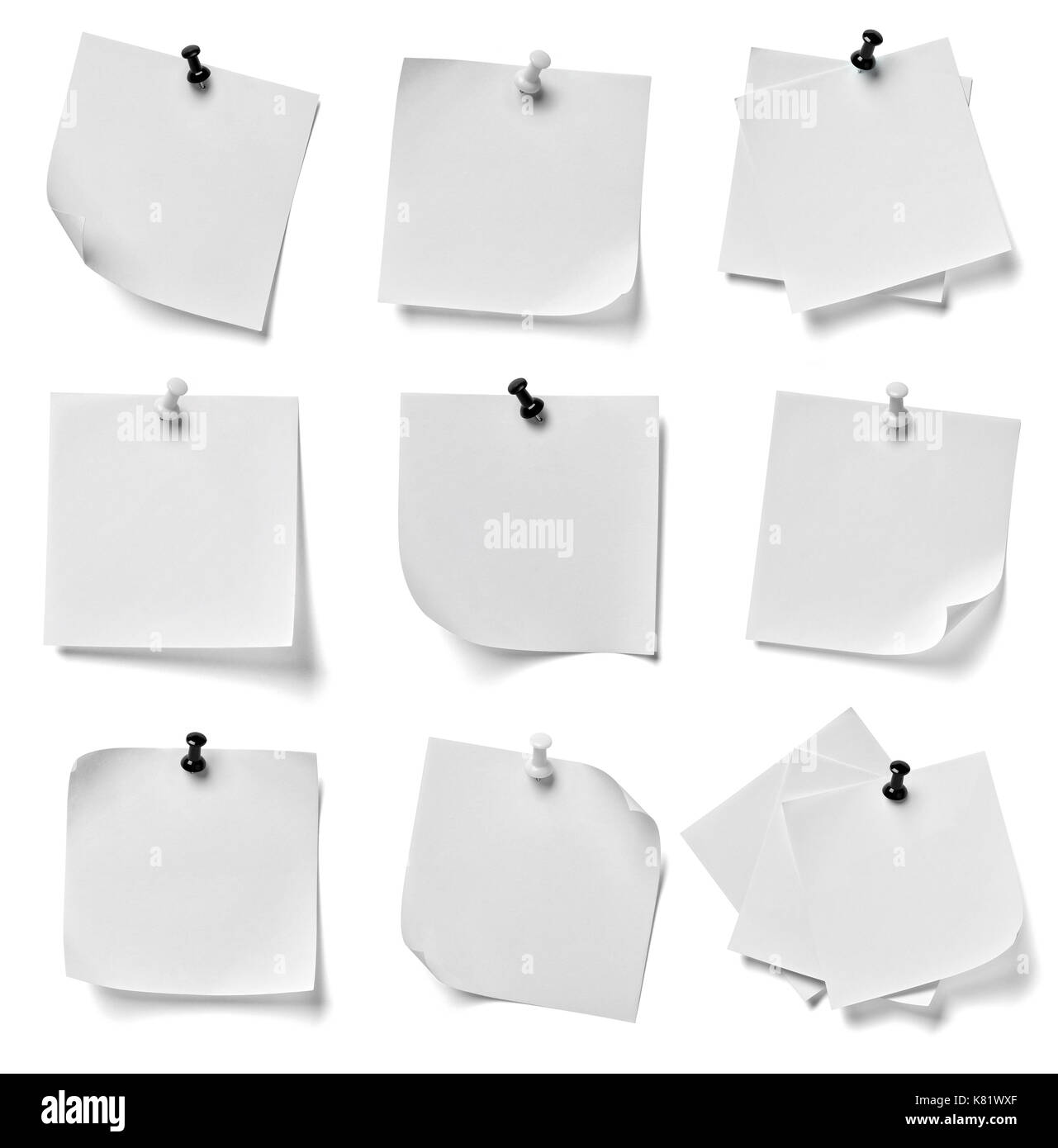 collection of various note paper with a red push pin on white ...