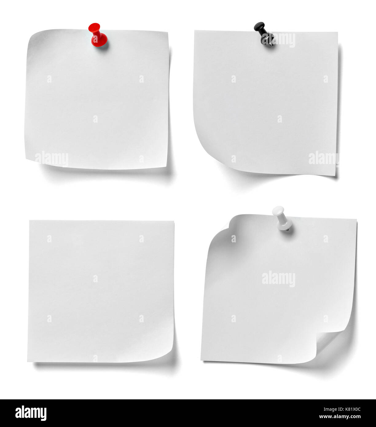 collection of various note paper with a red push pin on white ...