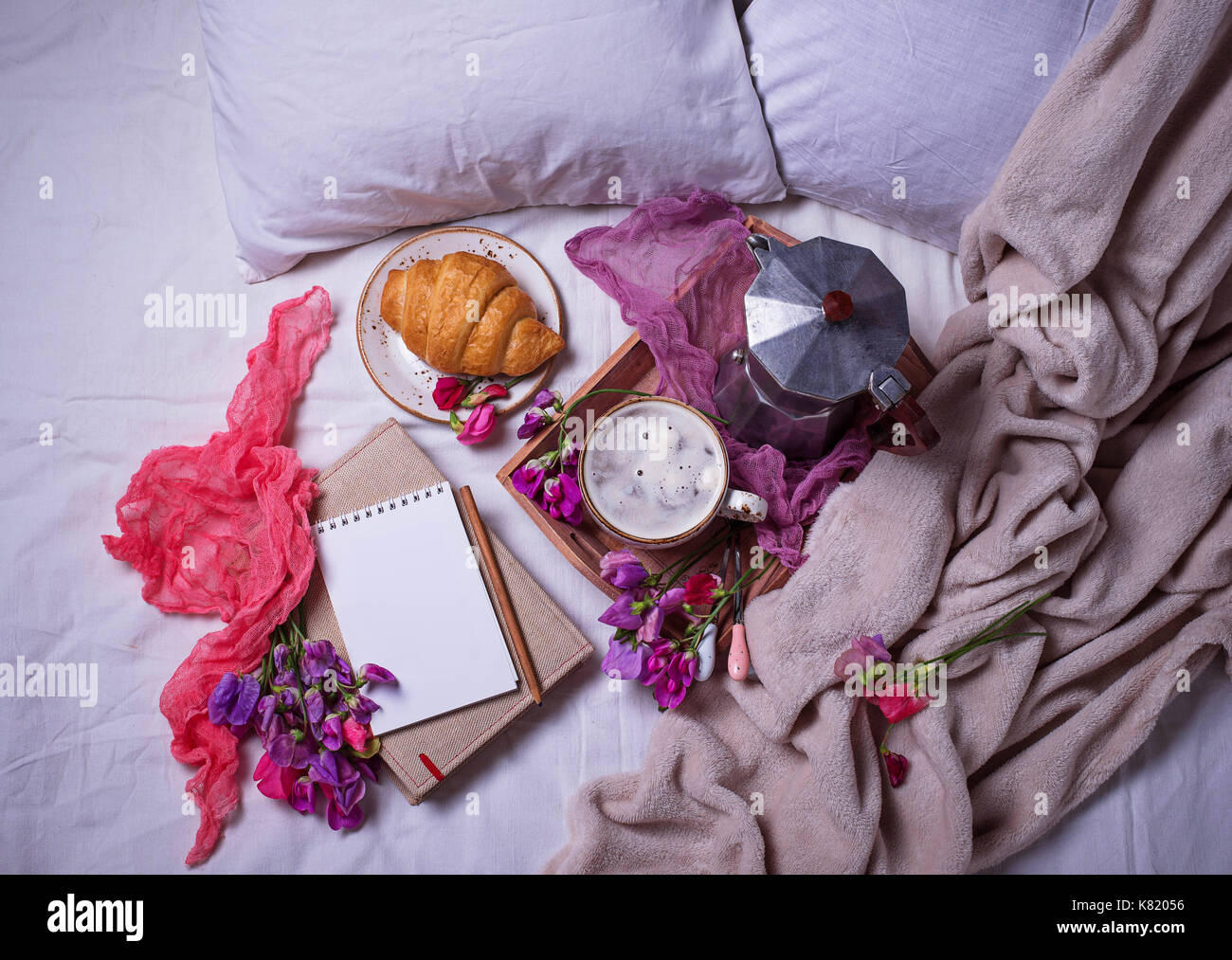 Breakfast in bad with croissants and coffee Stock Photo Alamy