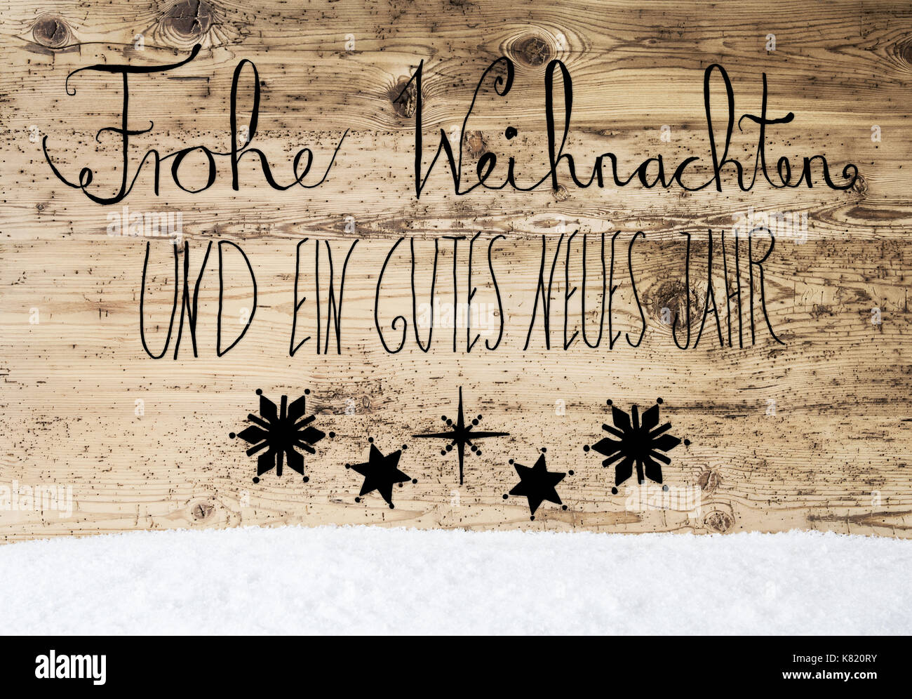 Calligraphy Gutes Neues Means Happy New Year, Snow Stock Photo