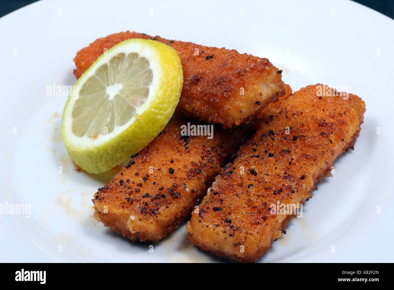 Fischstäbchen knusprig in der pfanne gebraten, Crispy fish sticks in the pan-fried Stock Photo