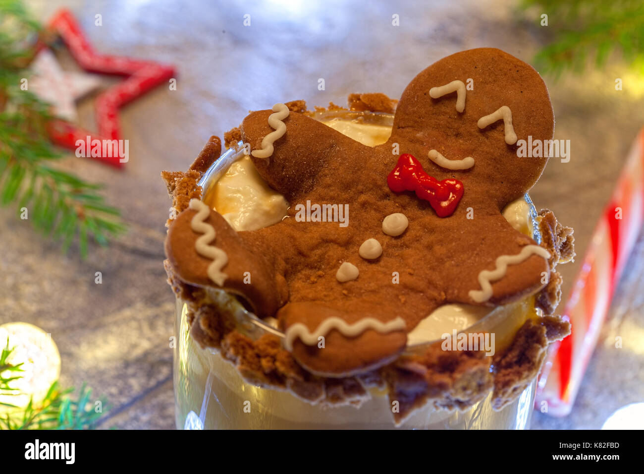 Drunken Gingerbread cookie man in a Christmas cocktail Stock Photo