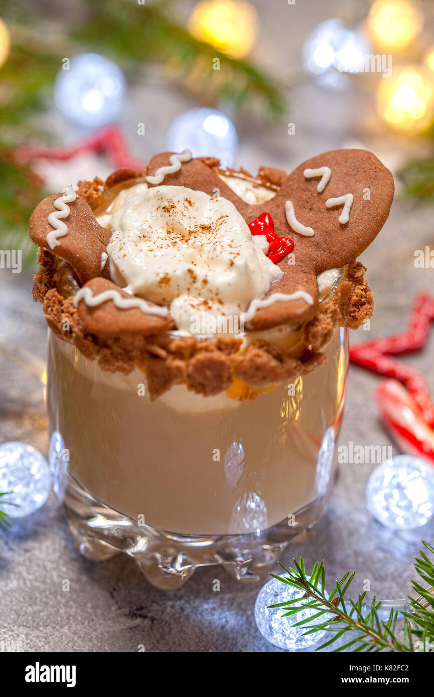 Drunken Gingerbread cookie man in a Christmas cocktail Stock Photo