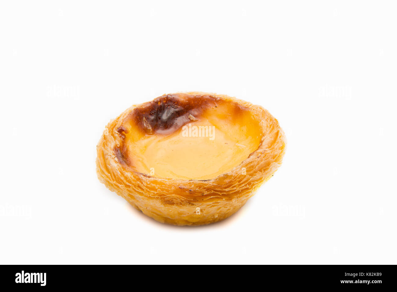 Egg Tarts or pasteis de nata isolated on white background. Typical