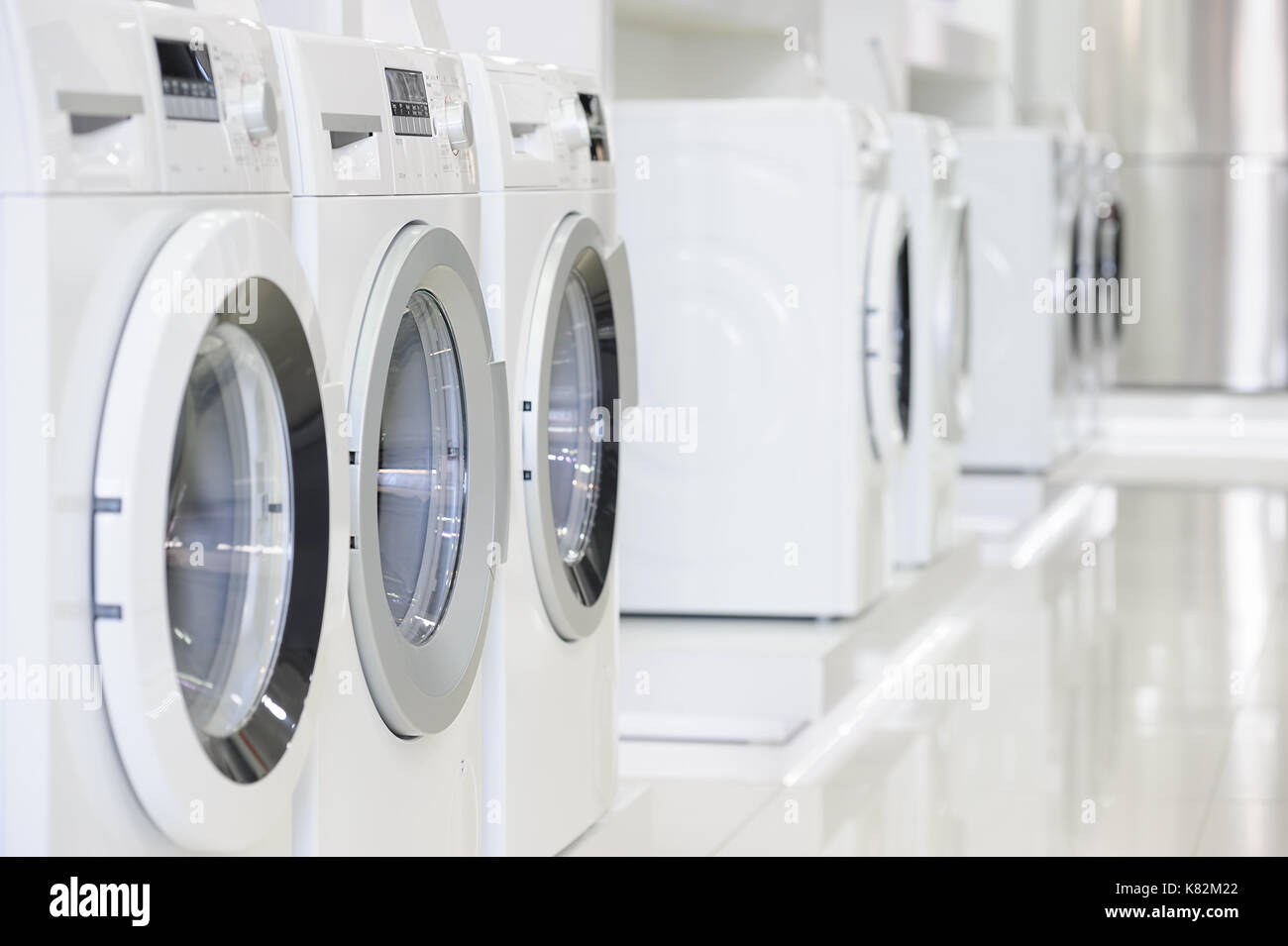 washing machines in appliance store Stock Photo