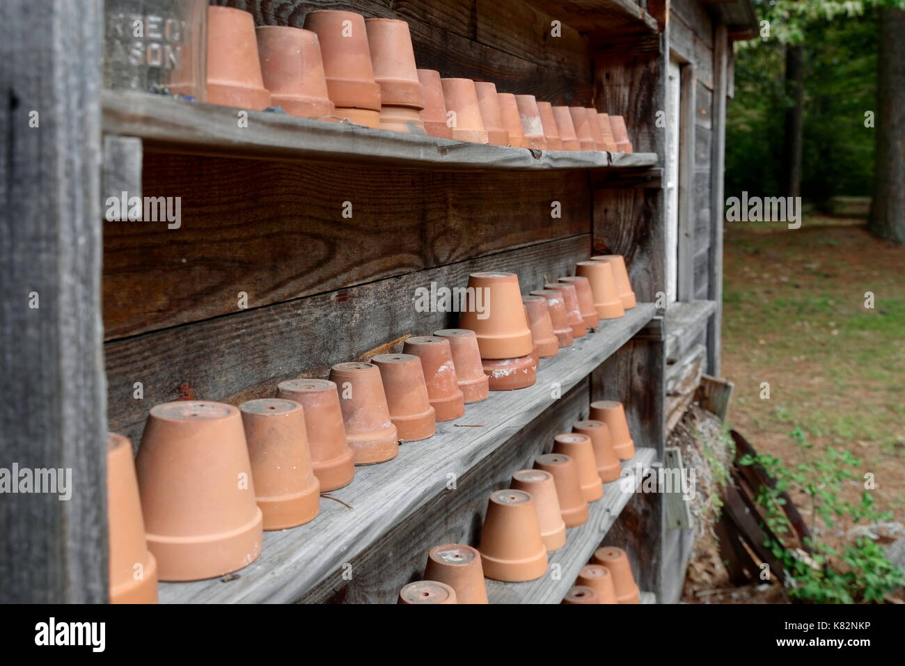 Clay Garden Pots On Shelves At The Furnacetown Living Heritage