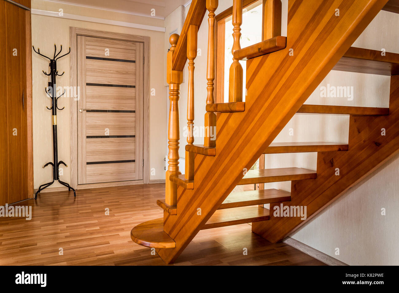 Steps wooden interior stairs of a private house closeup Stock Photo