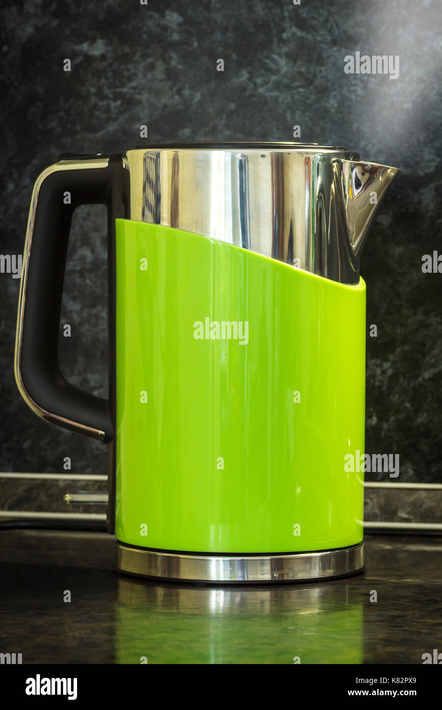 https://c8.alamy.com/comp/K82PX9/an-electric-green-kettle-is-boiling-in-the-kitchen-K82PX9.jpg