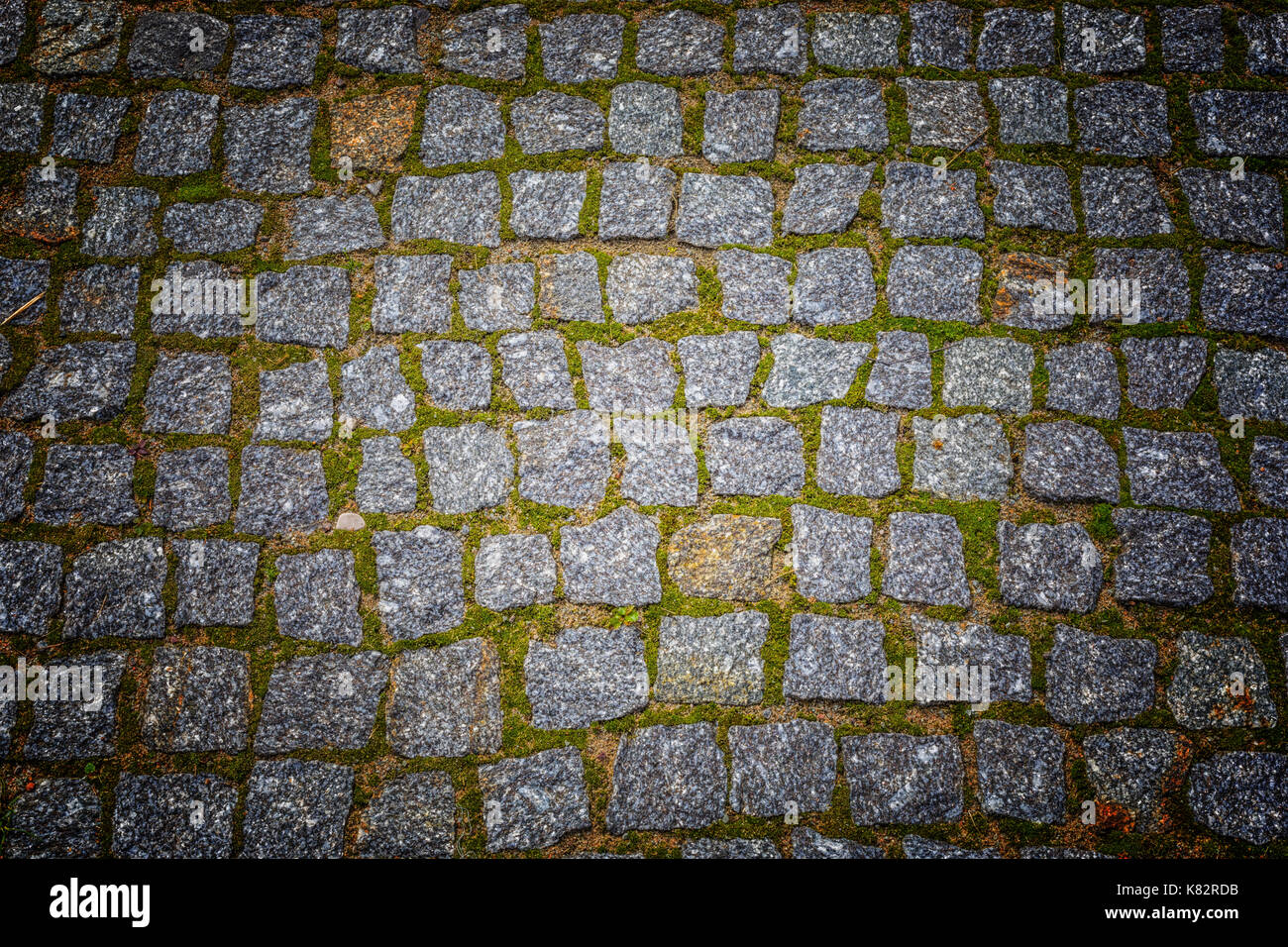 Abstract background of old cobblestone pavement texture with natural ...