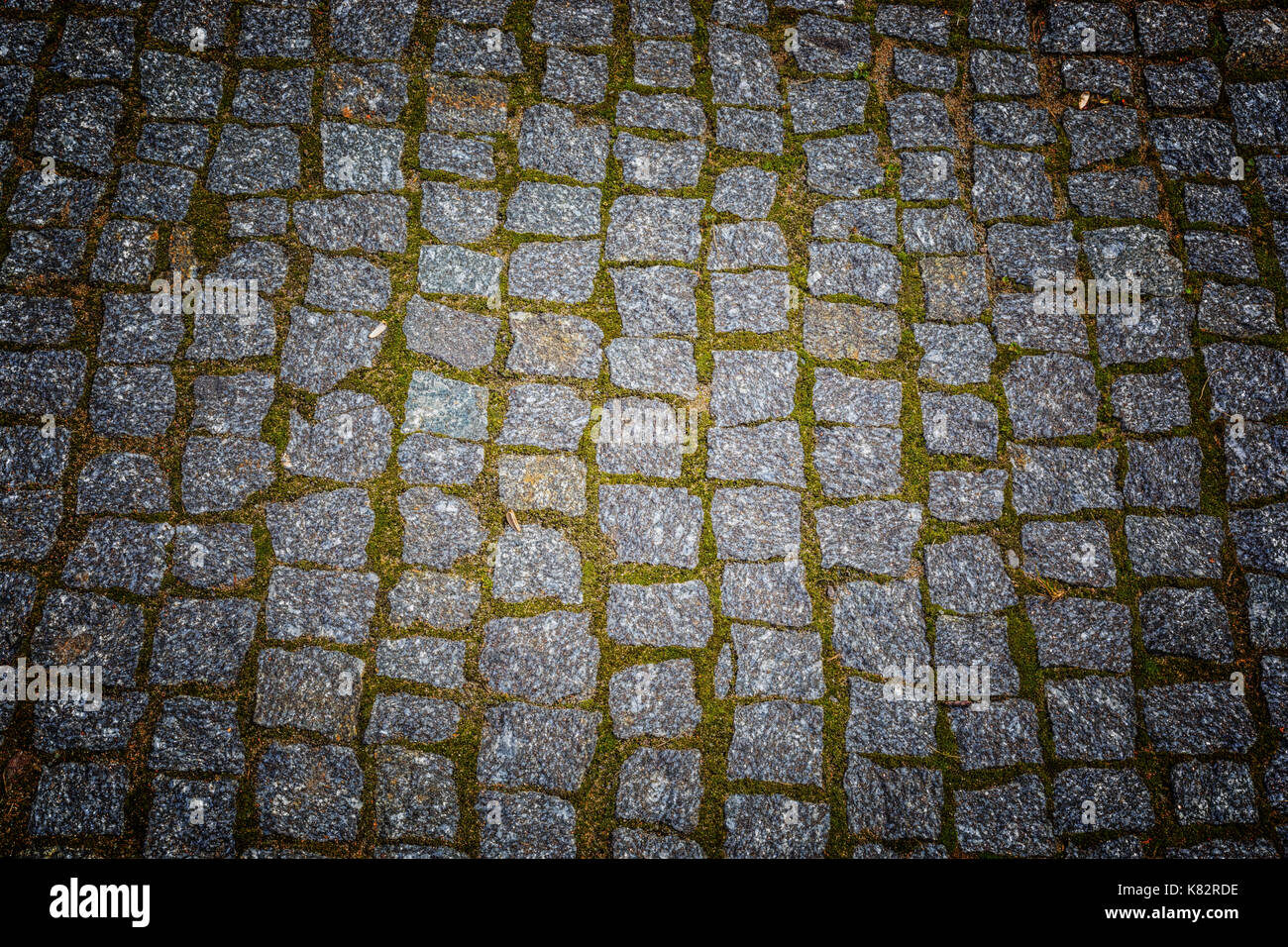 Abstract background of old cobblestone pavement texture with natural ...